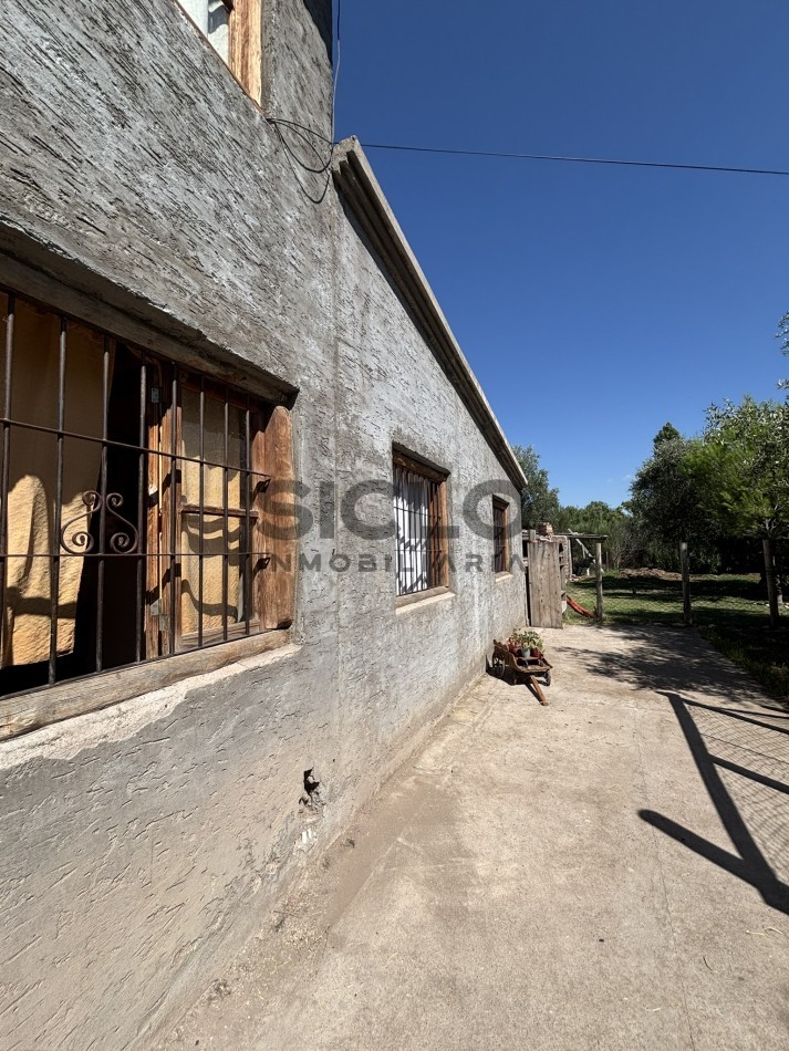 EXCELENTE PROPIEDAD EN RAMA CAIDA CON DOS CASAS 