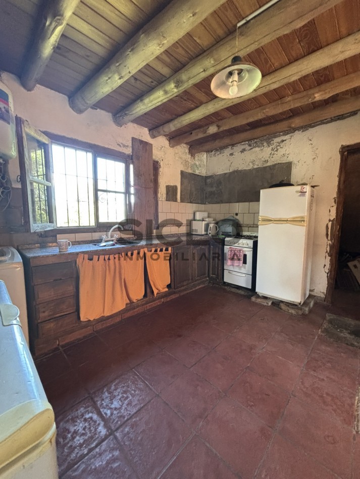 EXCELENTE PROPIEDAD EN RAMA CAIDA CON DOS CASAS 